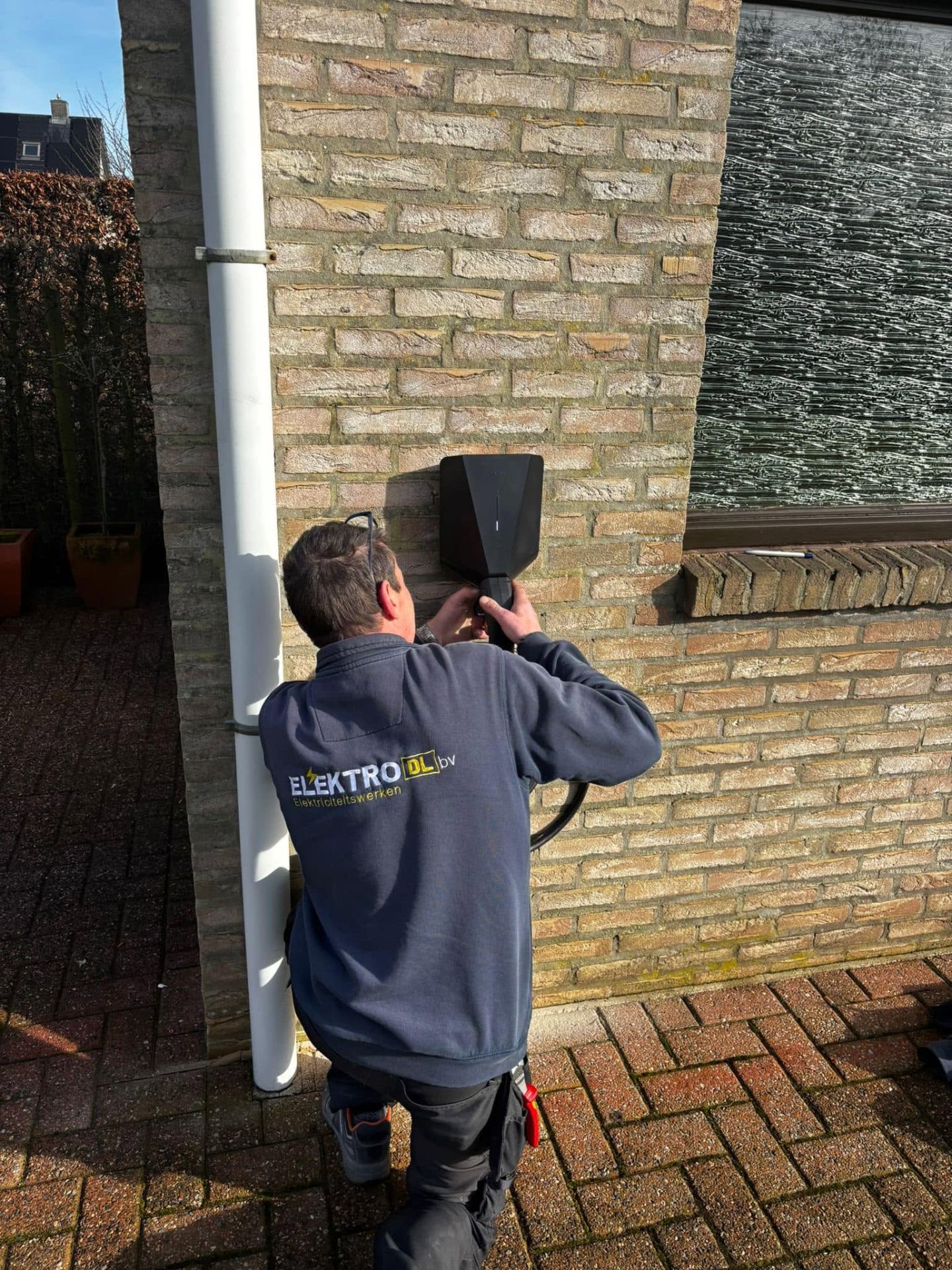 Plaatsing van een laadpaal aan een woning